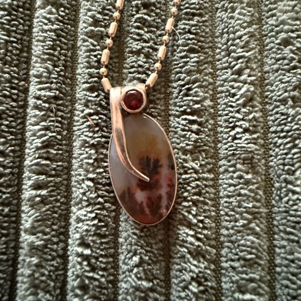 Sterling silver dendrite and garnet pendant